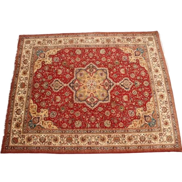 Versatile Persian Tabriz carpet suitable for various interior styles