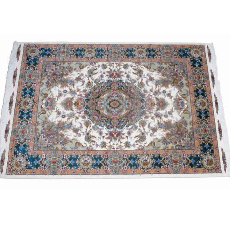 Persian Tabriz Carpet with hand made designs and beautiful shades of coloration