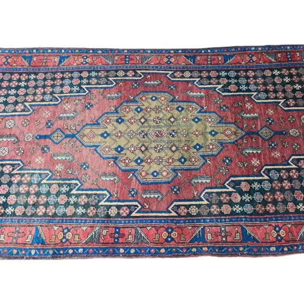 A zoomed-in image highlighting the intricate details and high-quality wool of the Persian Kurdish runner.