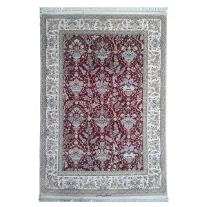 Immerse yourself in Persian culture with this authentic Isfahan rug, a masterpiece of design.