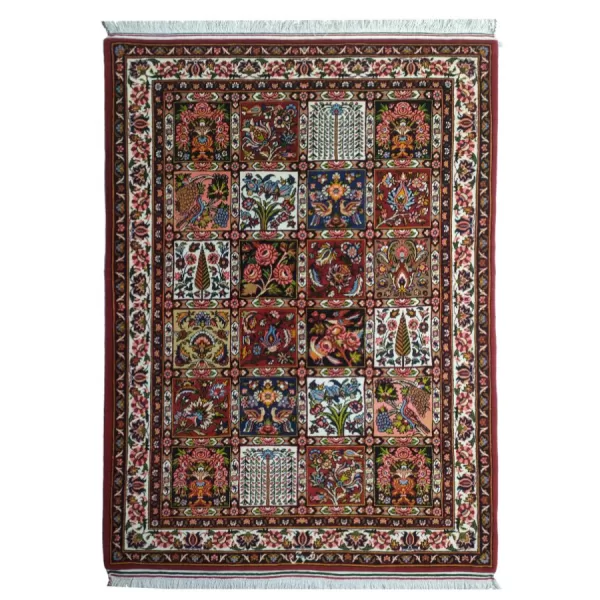 handmade Persian Bakhtiari rug with intricate floral border