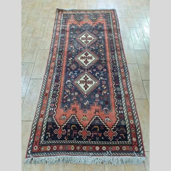 Full view of a handmade Persian Afshar runner in vibrant colors and intricate patterns.