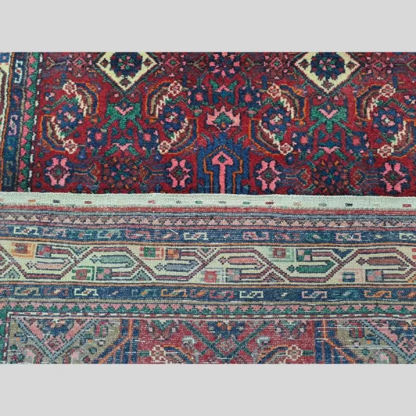 Close inspection of knot count in the Persian Hamadan Runner, Bradran Persian Carpet Qatar.