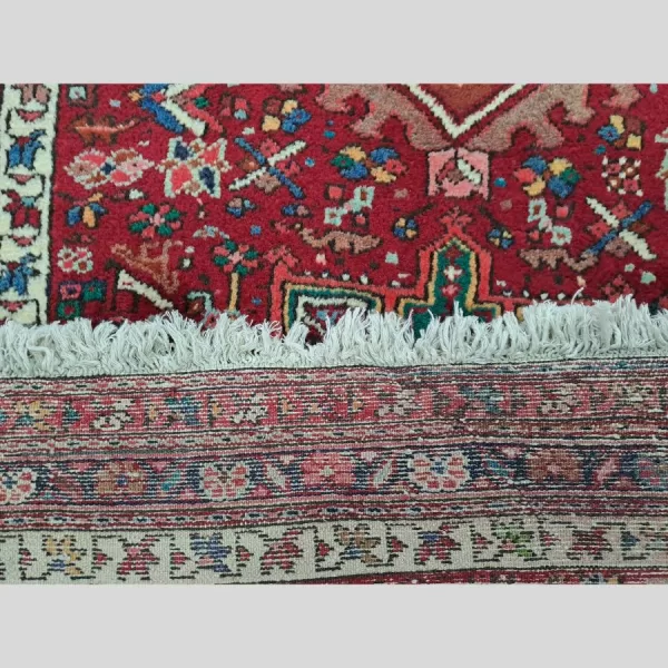 Close-up of the knots count and craftsmanship of the Persian runner.