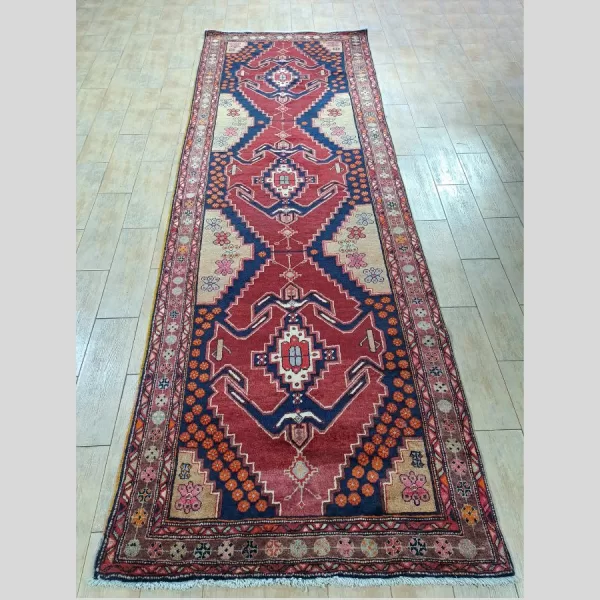 Full view of a luxurious Persian Afshar runner with intricate traditional designs.